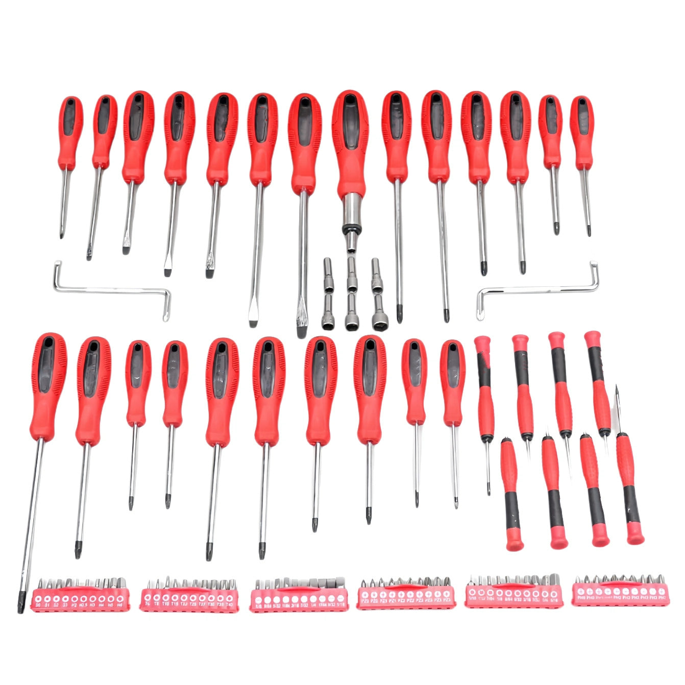 Set of red screwdrivers and accessories on a white background