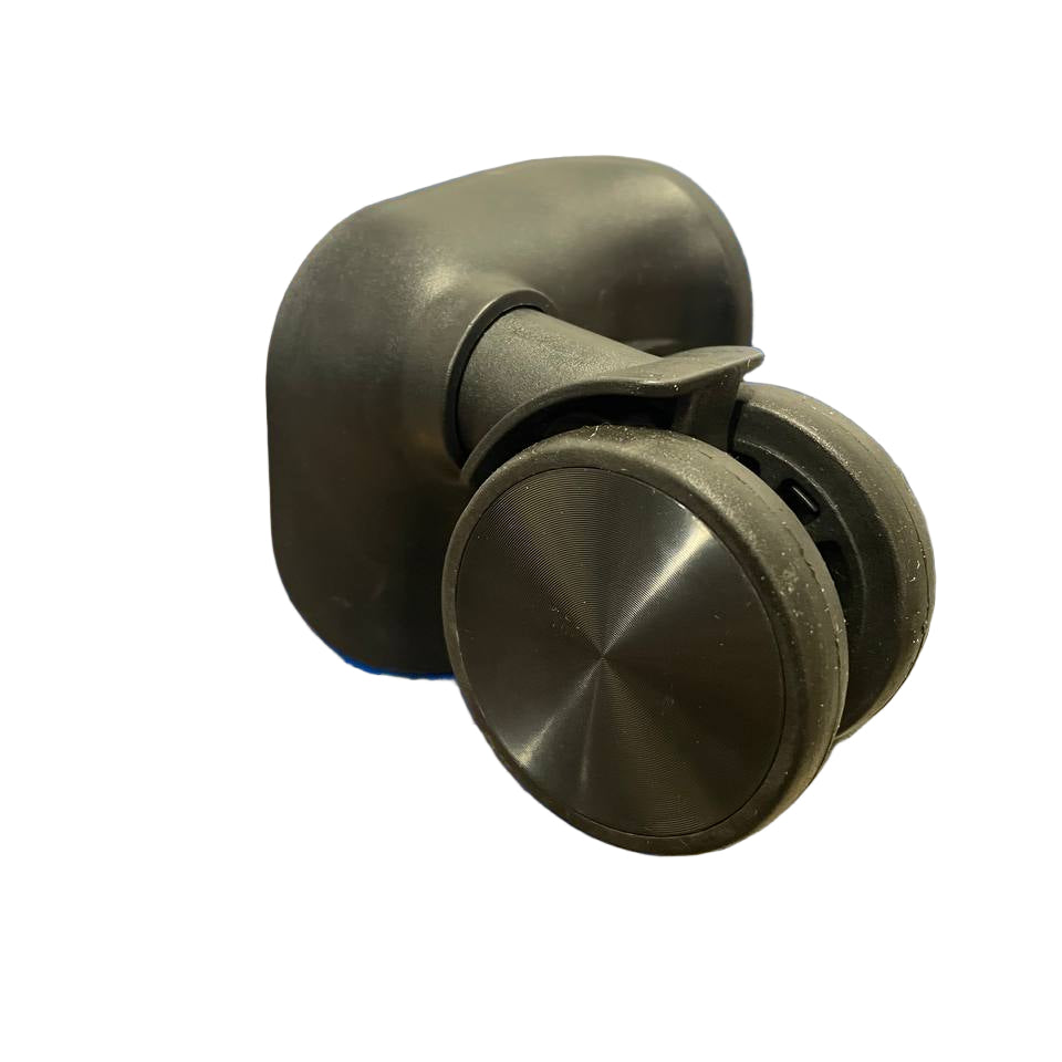 Close-up of a blue suitcase handle with a metallic wheel on a tiled floor.