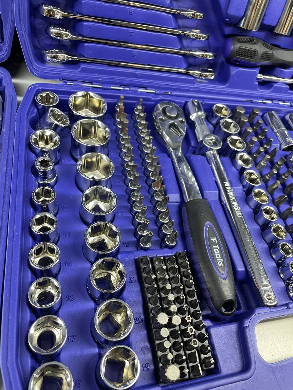 Mechanic tool set with various tools in a blue case