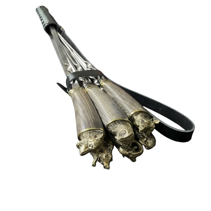 A luxurious gift set of "Wild Animals" skewers in a leather quiver.