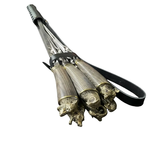 A luxurious gift set of "Wild Animals" skewers in a leather quiver.