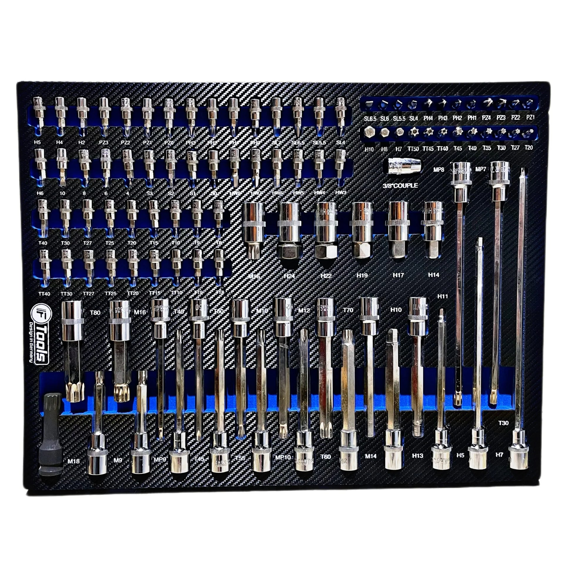Uzmavu un instrumentu komplekts uz melnas paplātes ar redzamu zīmola nosaukumu