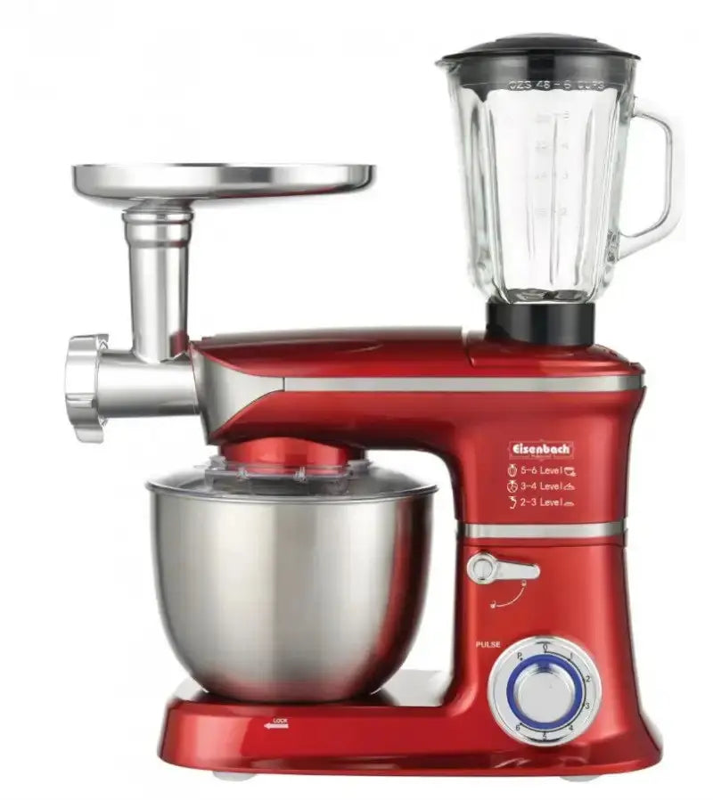 Красный кухонный миксер с насадками на белом фоне