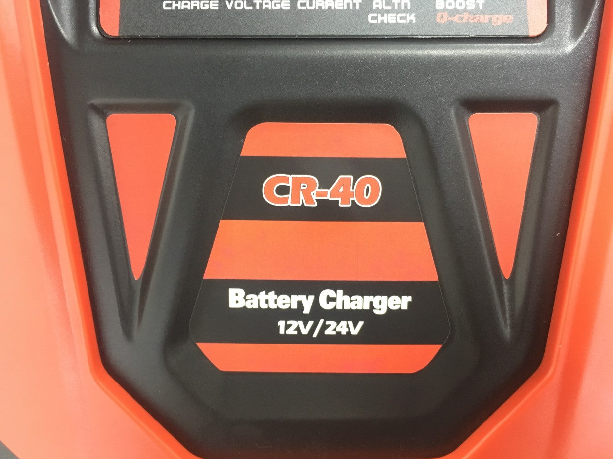 Battery charger with 'CR-40' label on an orange and black background