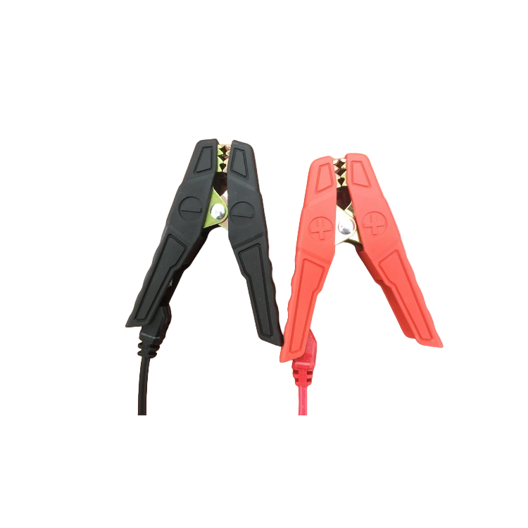 Black and red alligator clips on a white background