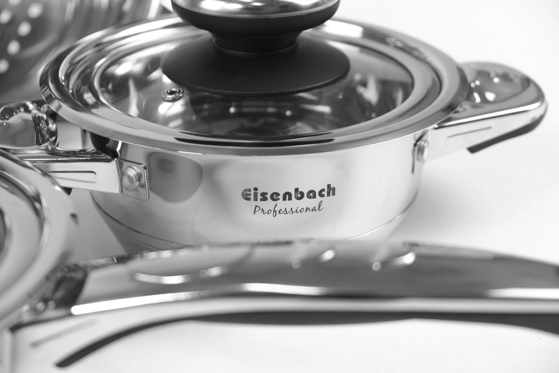 Stainless steel pot with lid featuring Eisenbach Professional branding on a white background