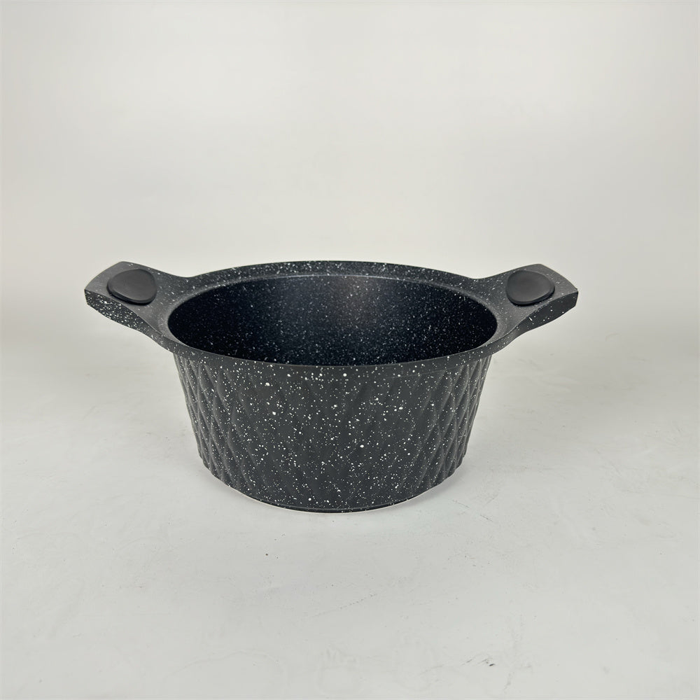 Black speckled bowl with handles on a white background