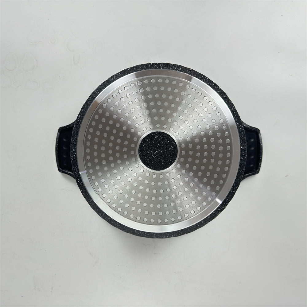 Stainless steel lid with black handle on a light gray background