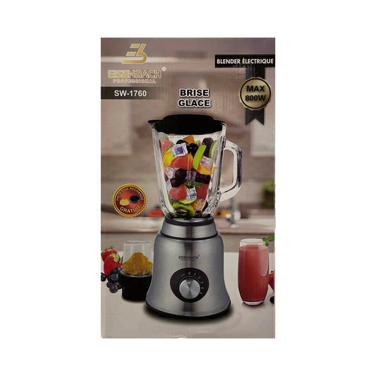 Blender packaging with fruit in the blender and a glass of juice on a white background