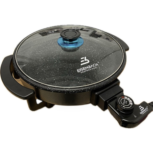 Electric hot plate with glass lid and control knobs on a white background