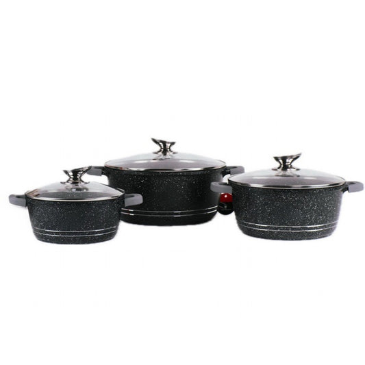 Set of black speckled cookware with lids on a white background
