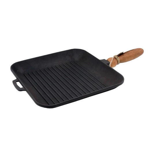 Black сast iron grill pan with wooden handle on a white background