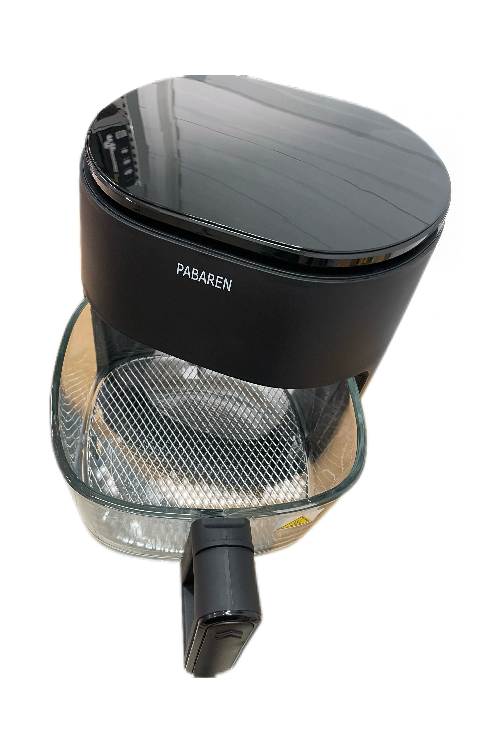 Top view of black air fryer with glass bowl extended on white background