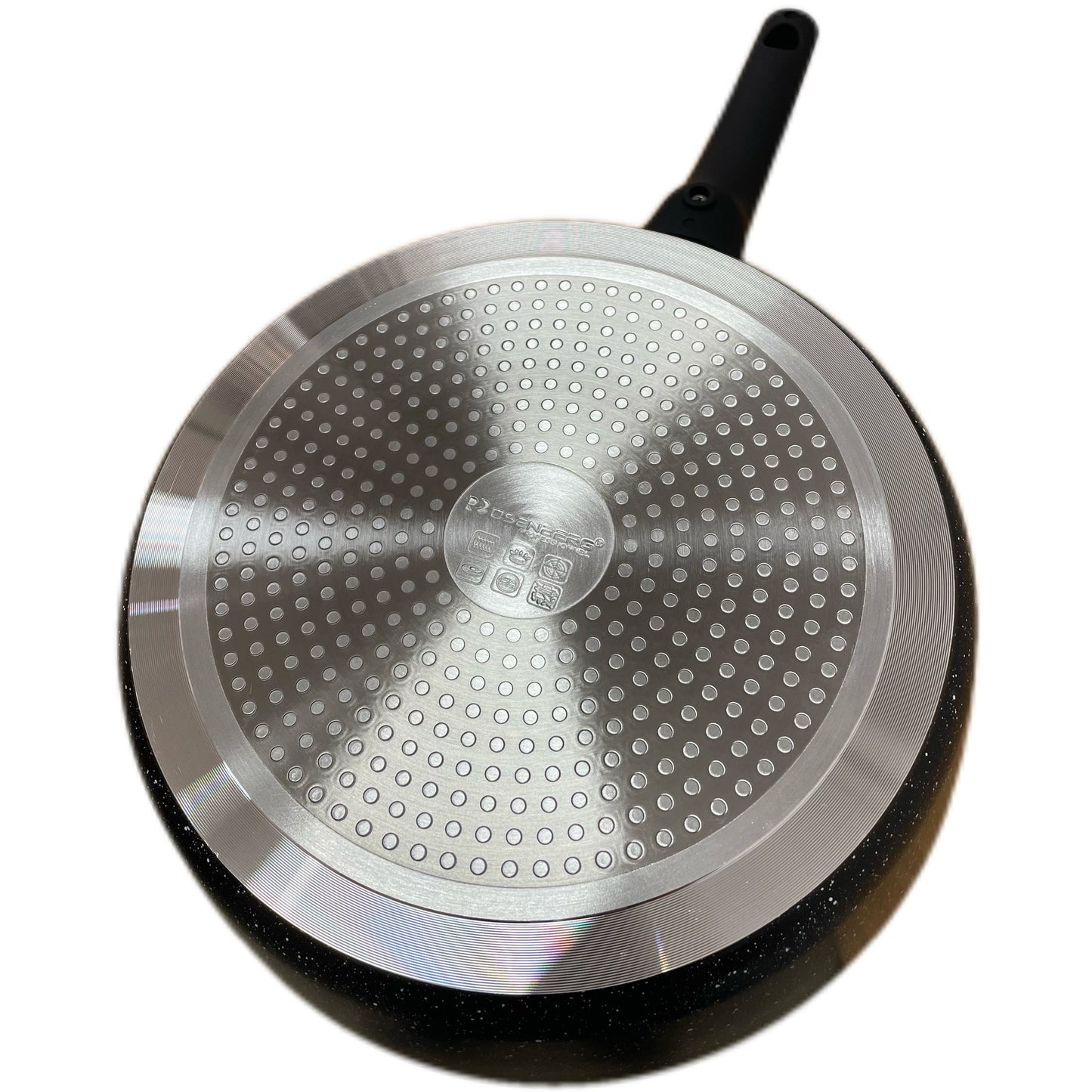 Stainless steel frying pan with black handle on a white background