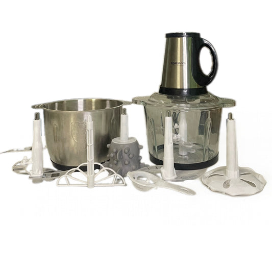 Meat and vegetable chopper with glass and metal bowl and chopping attachments on white background
