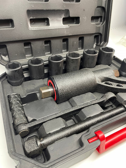 Set of tools in a gray tool case on a white background
