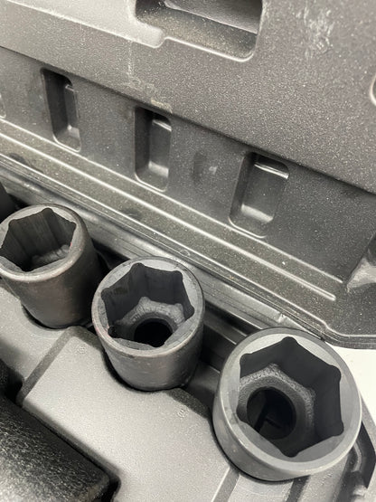 Close-up of a tool set with sockets and a toolbox
