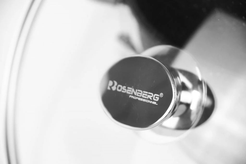 Close-up of a Rosenberg professional logo on a metallic surface