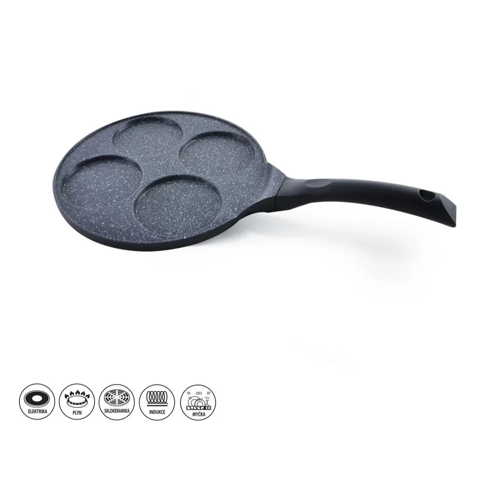 Black speckled frying pan on a white background